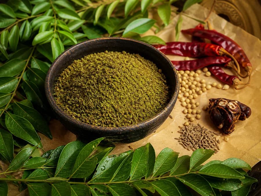 Curry Leaf Idli Podi spice blend with its featured ingredients
